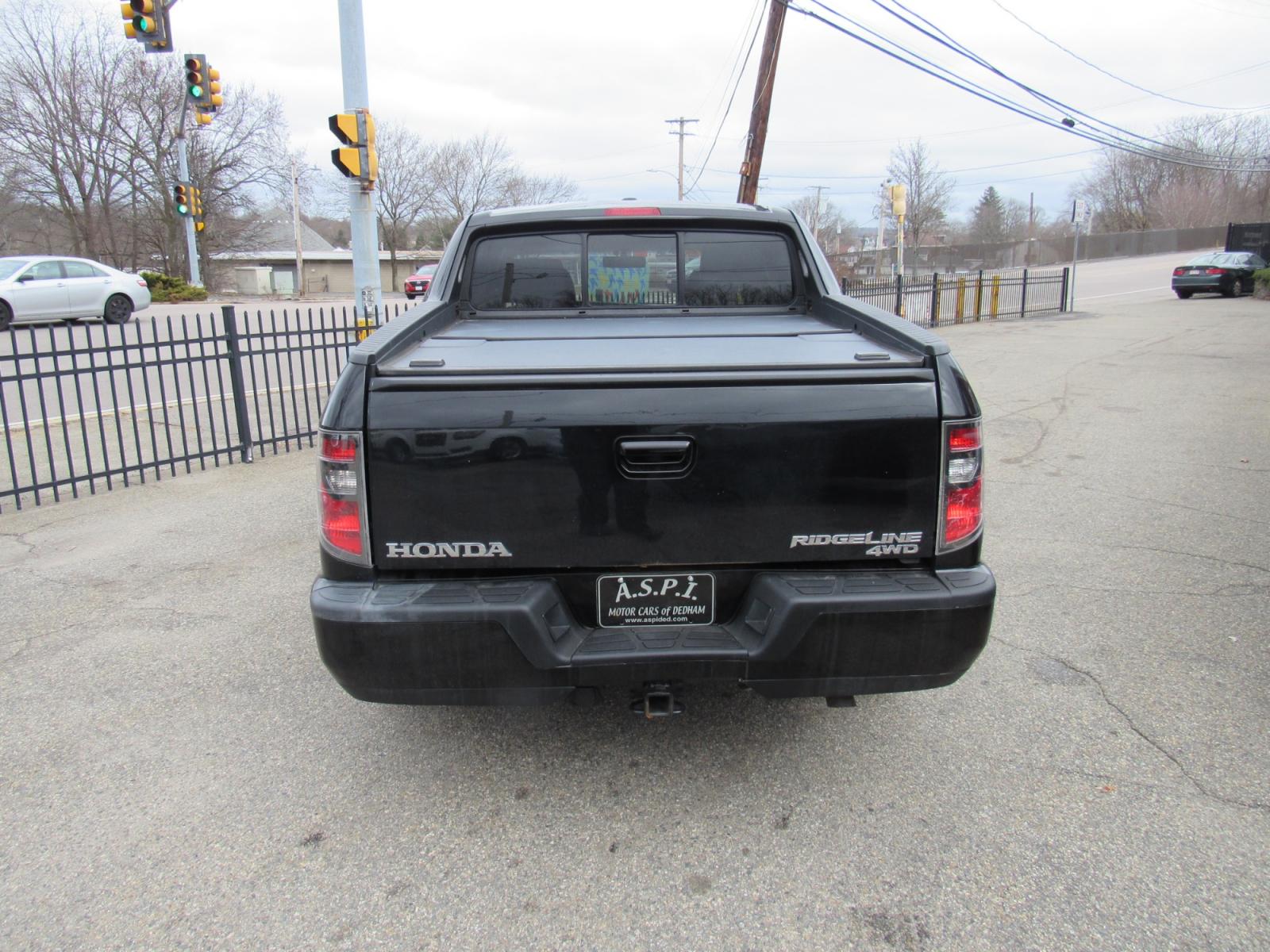2012 BLACK /Gray Honda Ridgeline RTL (5FPYK1F56CB) , Automatic transmission, located at 215 Milton St, Dedham, MA, 02026, (781) 329-5144, 42.241905, -71.157295 - This nice Ridgeline is in excellent condition. Runs like new. All ASPI Motor Cars vehicles are fully serviced before they are delivered to assure the highest quality used vehicles. Comes with a 3/3 warranty included in the price. call for details. Prices on all vehicles do not include $299.95 Doc - Photo #3